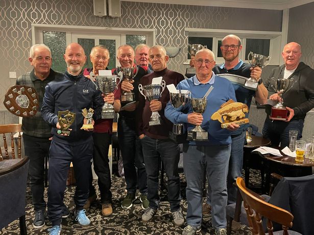 Alliance  Leicester AC 2021 winners celebrate with the clubs trophies at their AGM