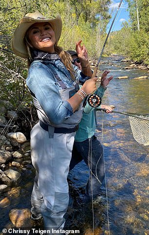 Here we go: The TV personality embraced her rugged surroundings while making a game first-time attempt at the popular pastime